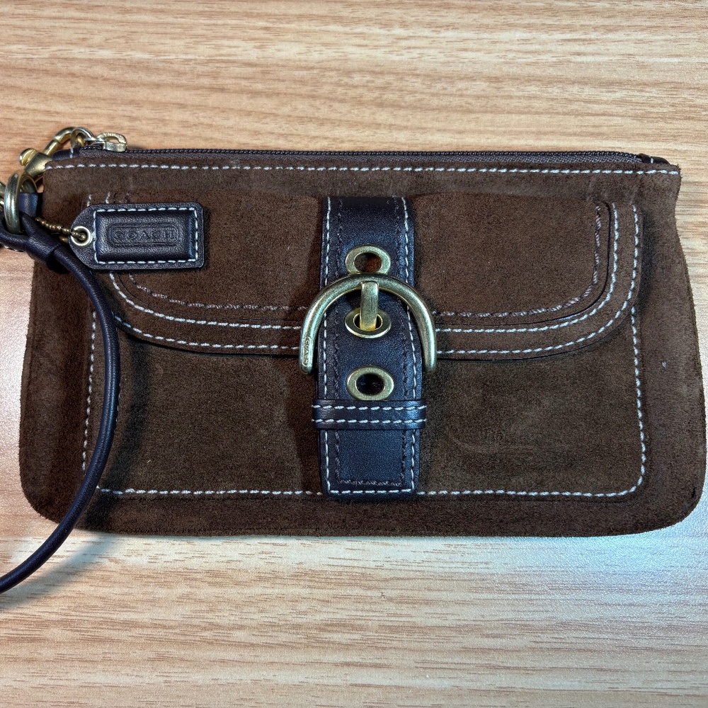 Coach Vintage Brown Suede Wristlet with Brass Bucket, zipper and strap.